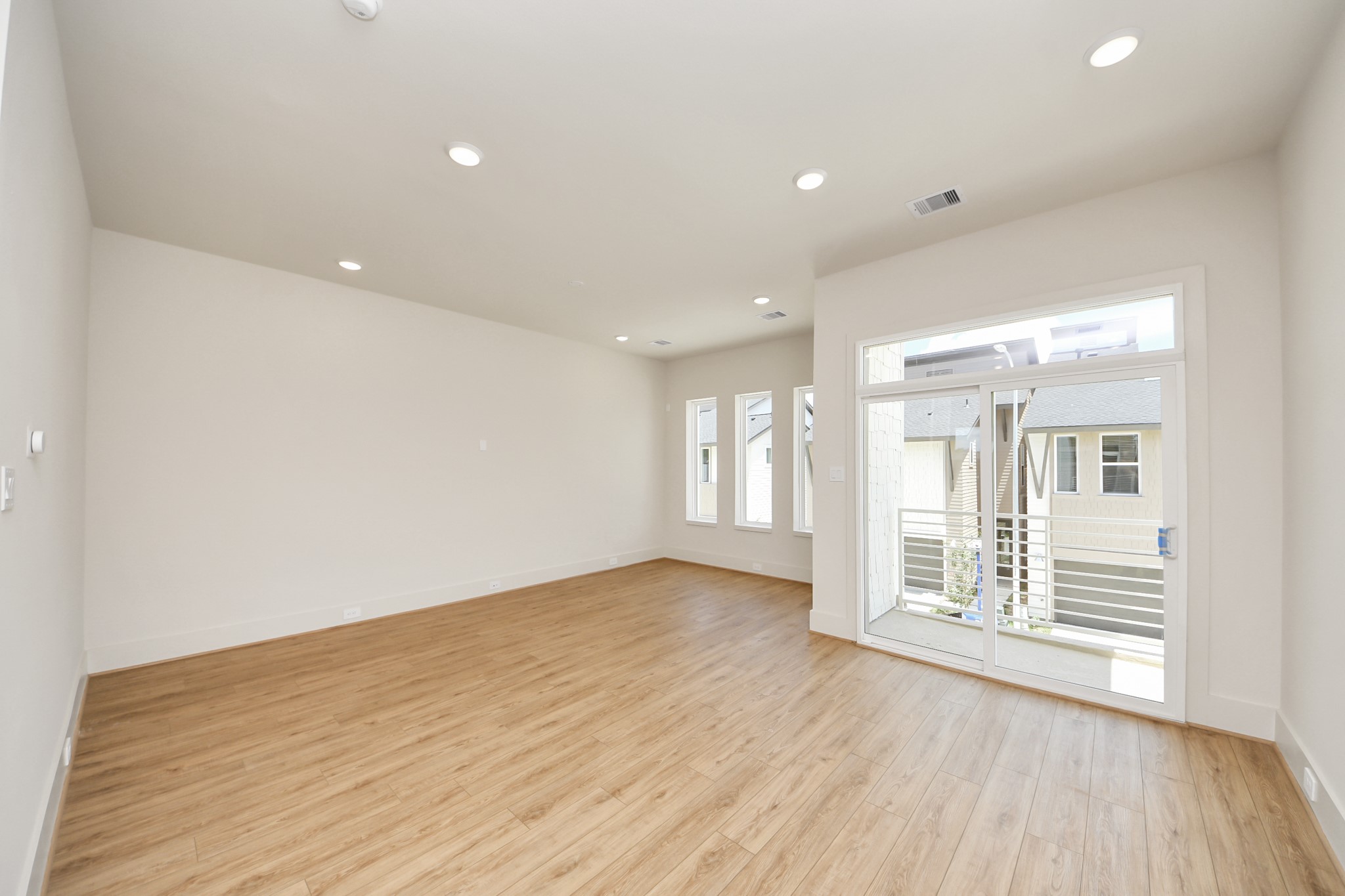 5903 Urban Pines Street Houston, TX 77091 - Photo 37 of 42 wooden floor in an empty room with a window