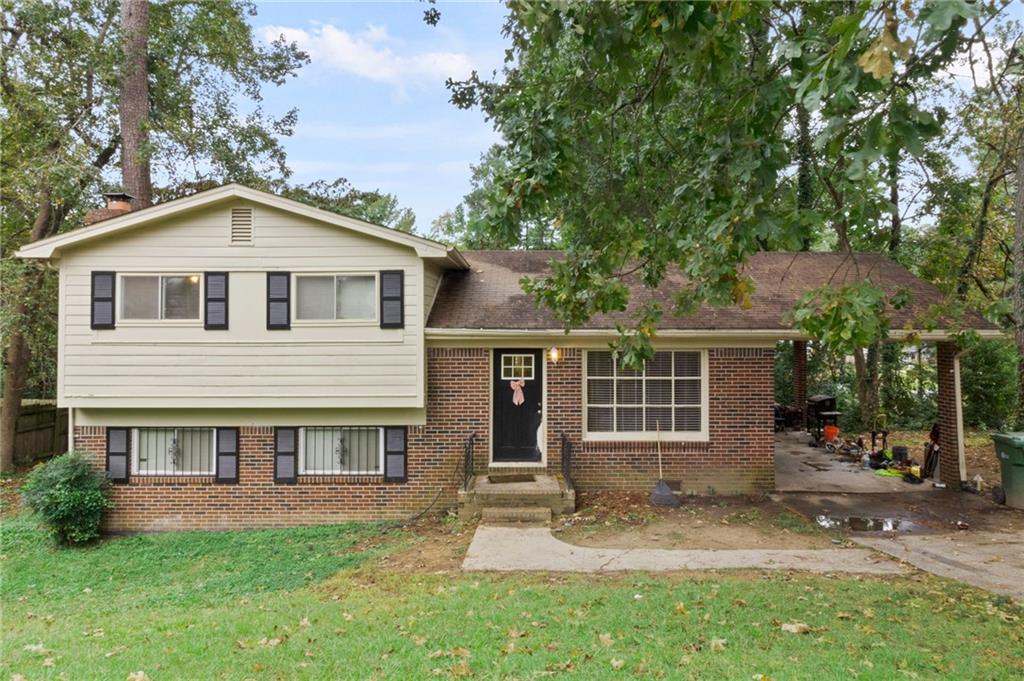 front view of a house with a yard