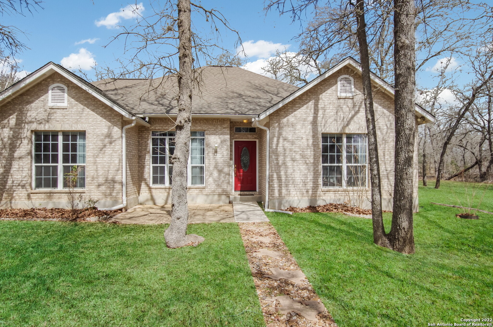 250 Hickory Run La Vernia, TX 78121 - Photo 1 of 1 a front view of a house with a yard and porch