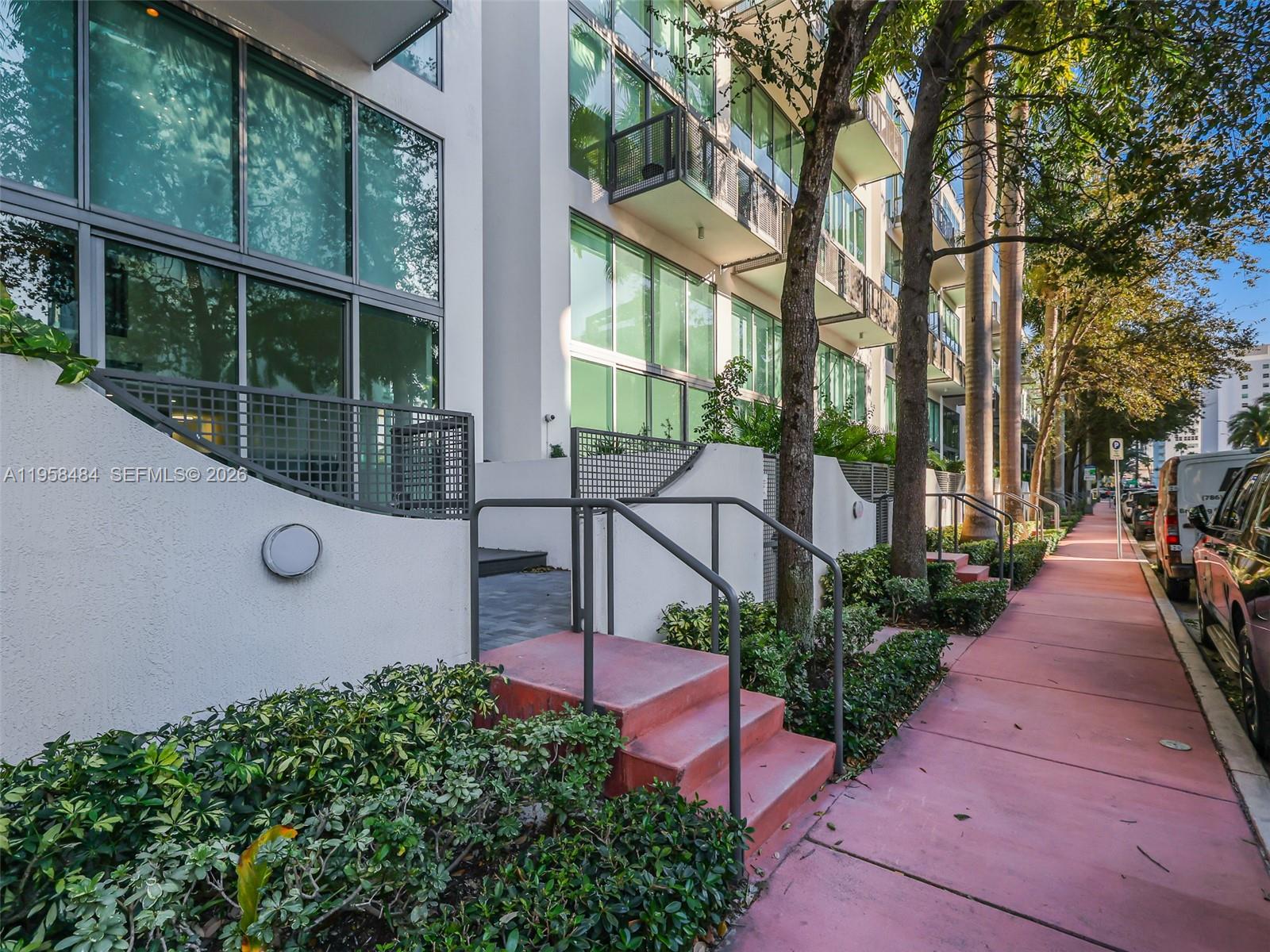6000 Collins Avenue, Unit 112 Miami Beach, FL 33140 - Photo 40 of 53 a view of a garden with patio