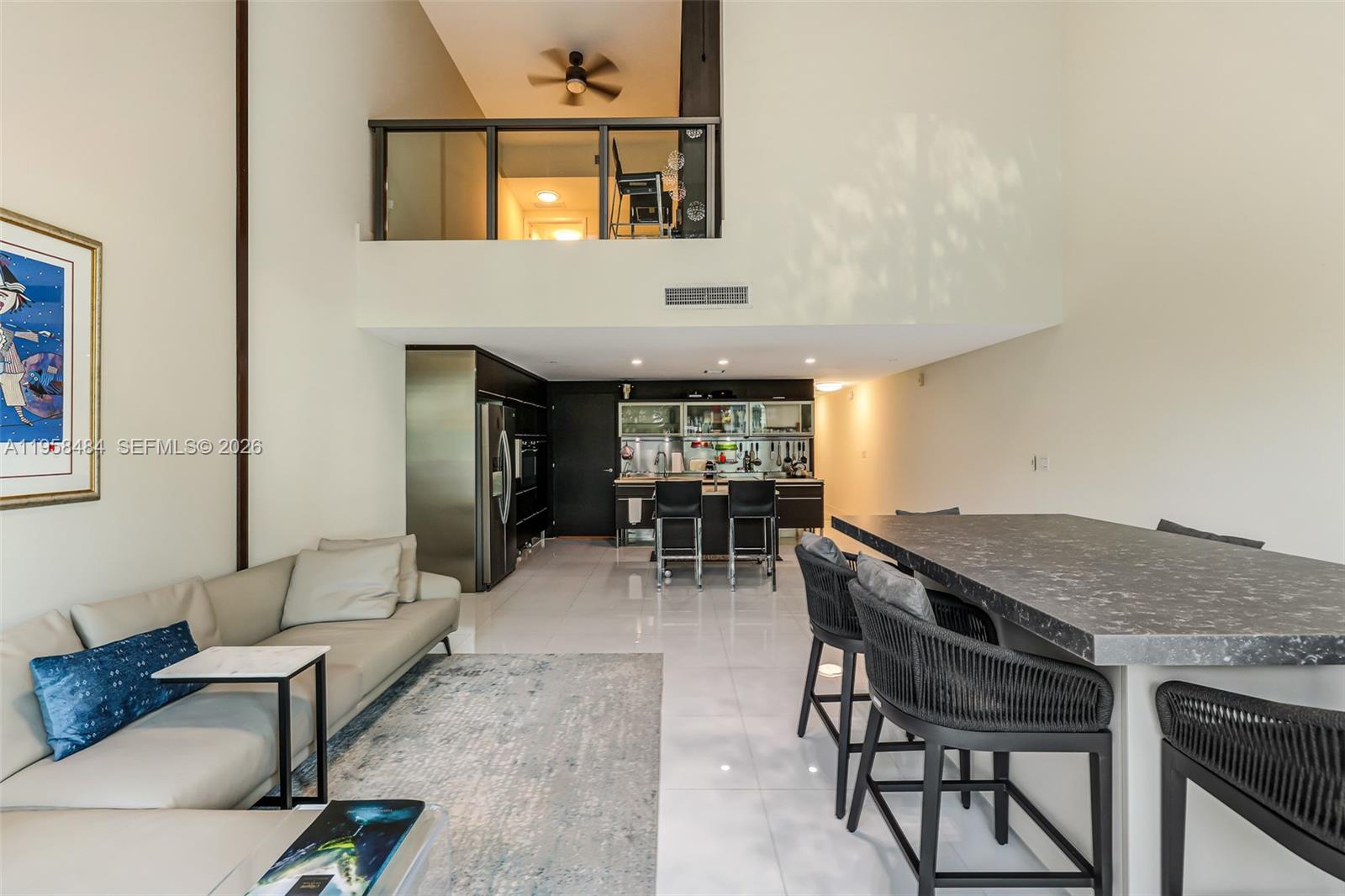 6000 Collins Avenue, Unit 112 Miami Beach, FL 33140 - Photo 5 of 53 a view of a livingroom with furniture and window