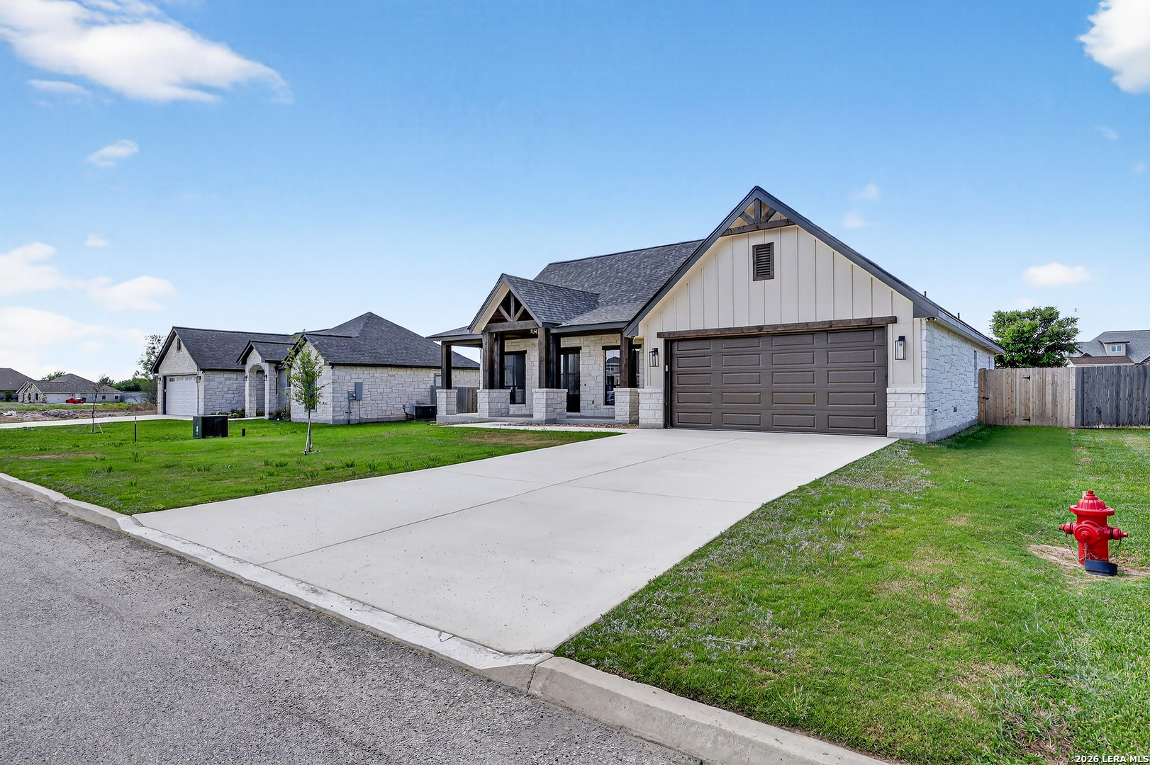 721 North Dickson Street Poth, TX 78147 - Photo 5 of 40 a front view of house with yard and green space