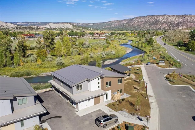a view of a lake with a building in front of it