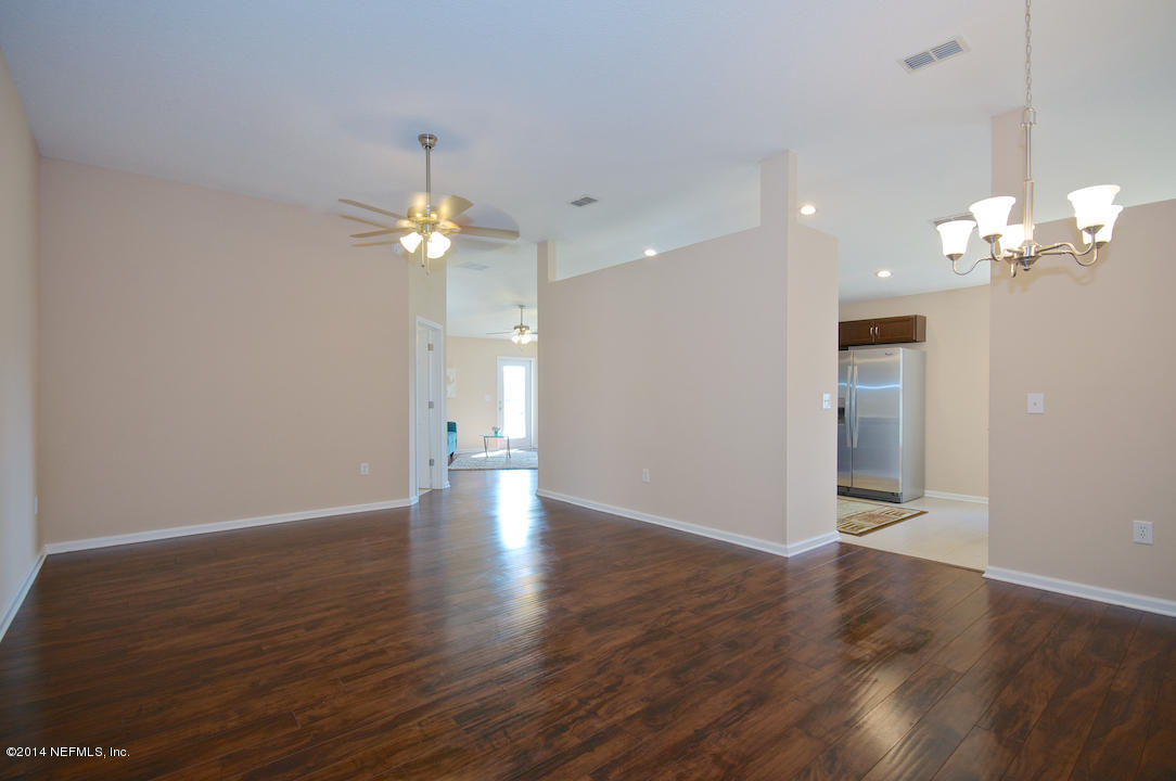 3656 West Star Leaf Road Jacksonville, FL 32210 - Photo 3 of 21 Expansive Living & Dining Rms