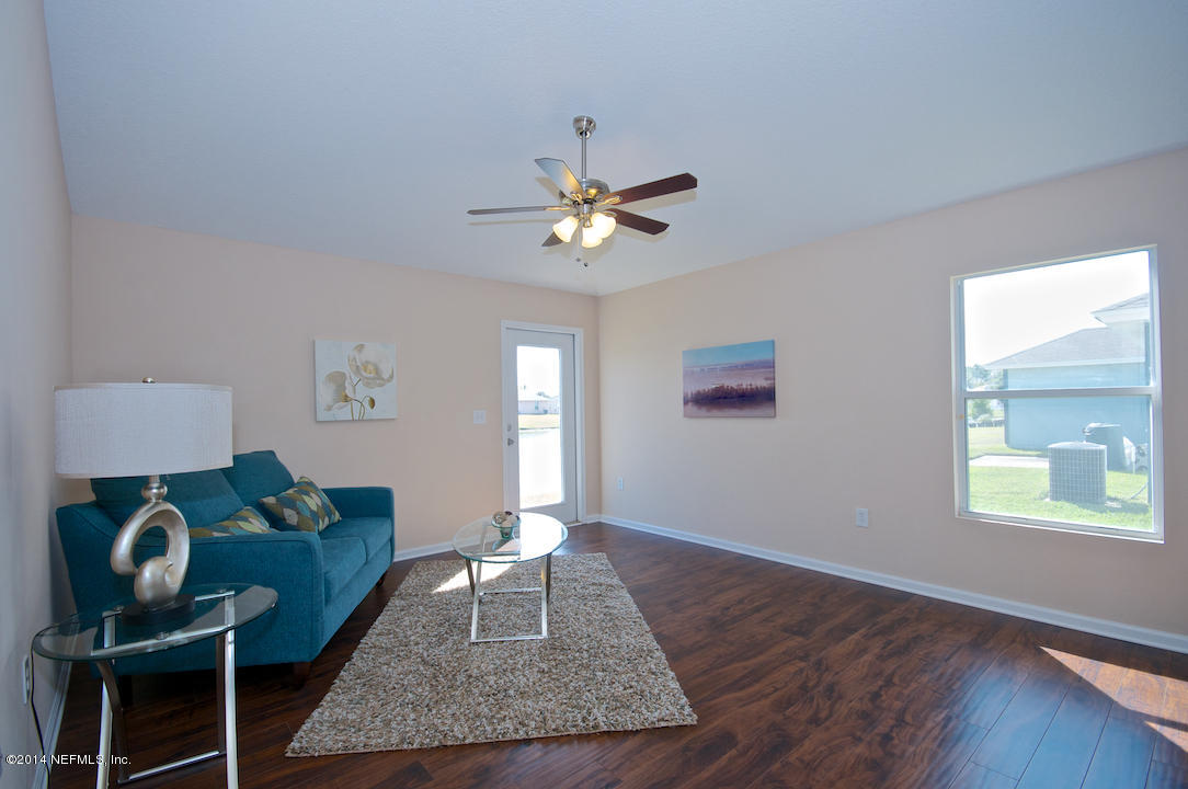 3656 West Star Leaf Road Jacksonville, FL 32210 - Photo 4 of 21 Family Rm-New Flooring, Paint, Clg Fan