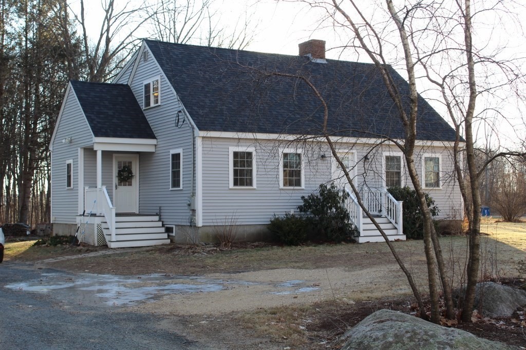 47 Old Coach Road Barre, MA 01005 - Photo 3 of 31 a view of a house with backyard and trees