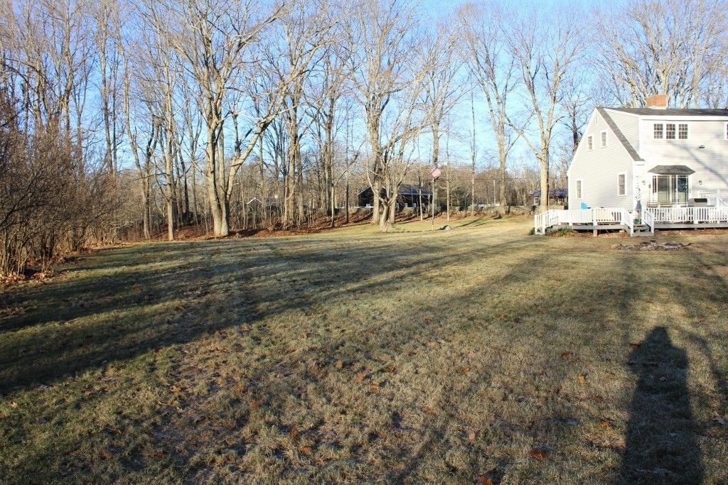 47 Old Coach Road Barre, MA 01005 - Photo 31 of 31 a view of a yard with large trees