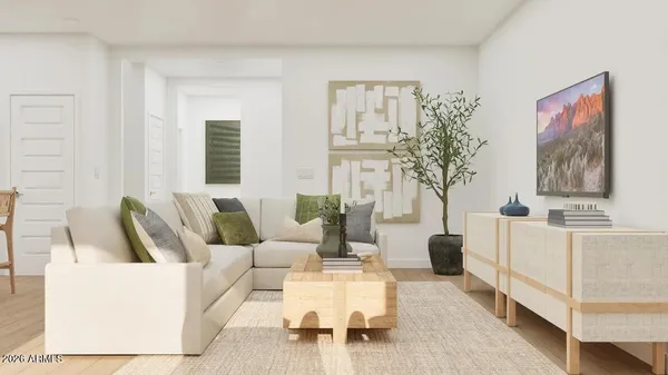 a living room with furniture and a window