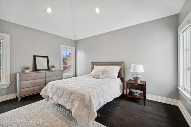 a bathroom with a double vanity sink and mirror