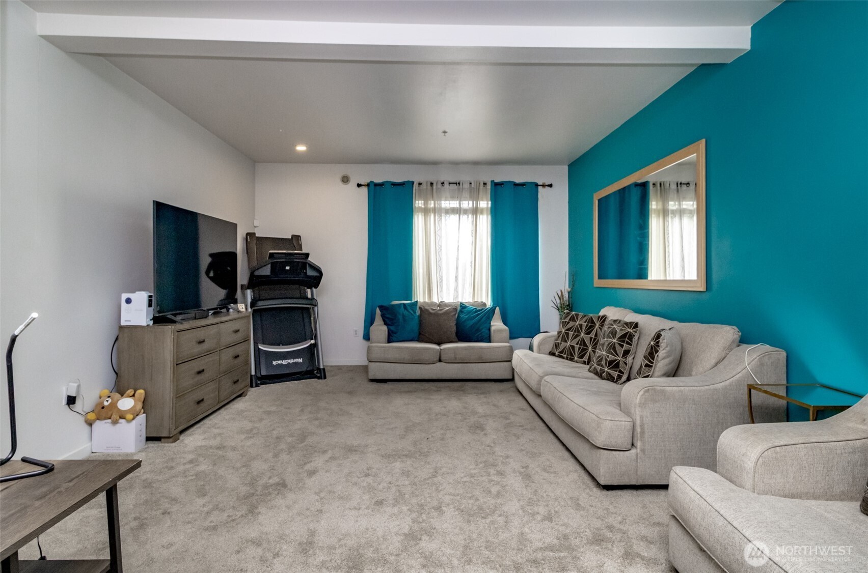5305 Military Road East, Unit A Tacoma, WA 98446 - Photo 14 of 39 a living room with furniture and a flat screen tv