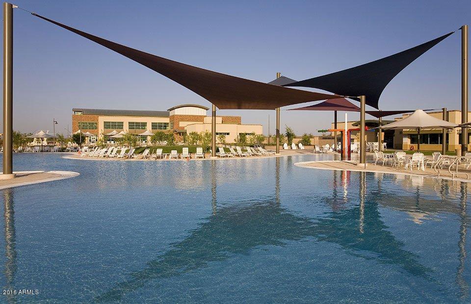 6656 West Springfield Way Florence, AZ 85132 - Photo 20 of 26 a swimming pool view with a outdoor seating space