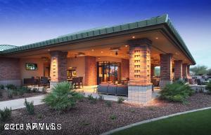 6656 West Springfield Way Florence, AZ 85132 - Photo 3 of 26 a front view of a house with outdoor seating