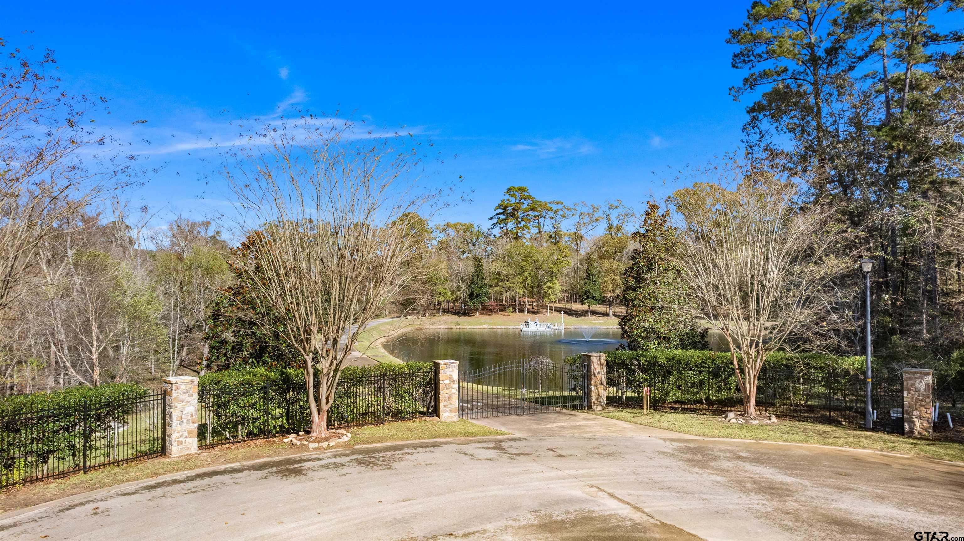 8702 Wilder Trail Tyler, TX 75703 - Photo 2 of 5 a view of a park with tree in front of it