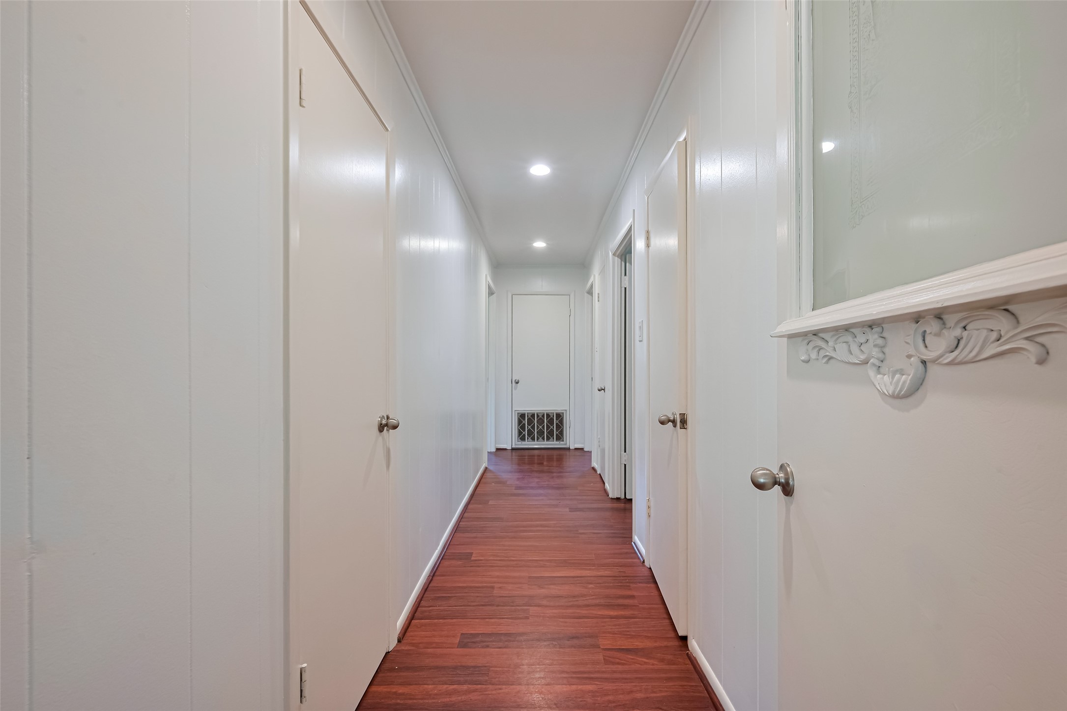 30525 Hegar Road Hockley, TX 77447 - Photo 19 of 49 a view of a hallway with wooden floor