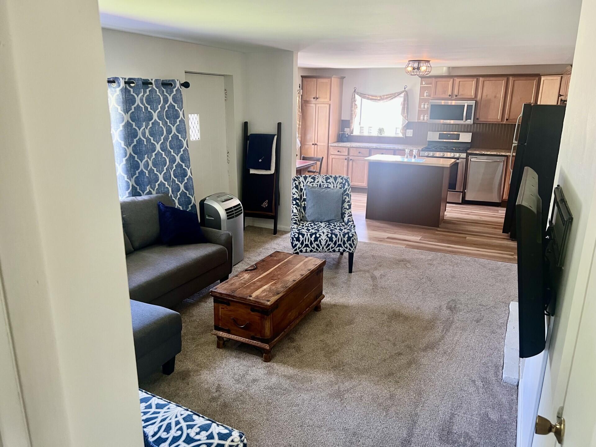 1233 Cumberland Head Road Plattsburgh, NY 12901 - Photo 11 of 24 open concept LR into eat in kitchen