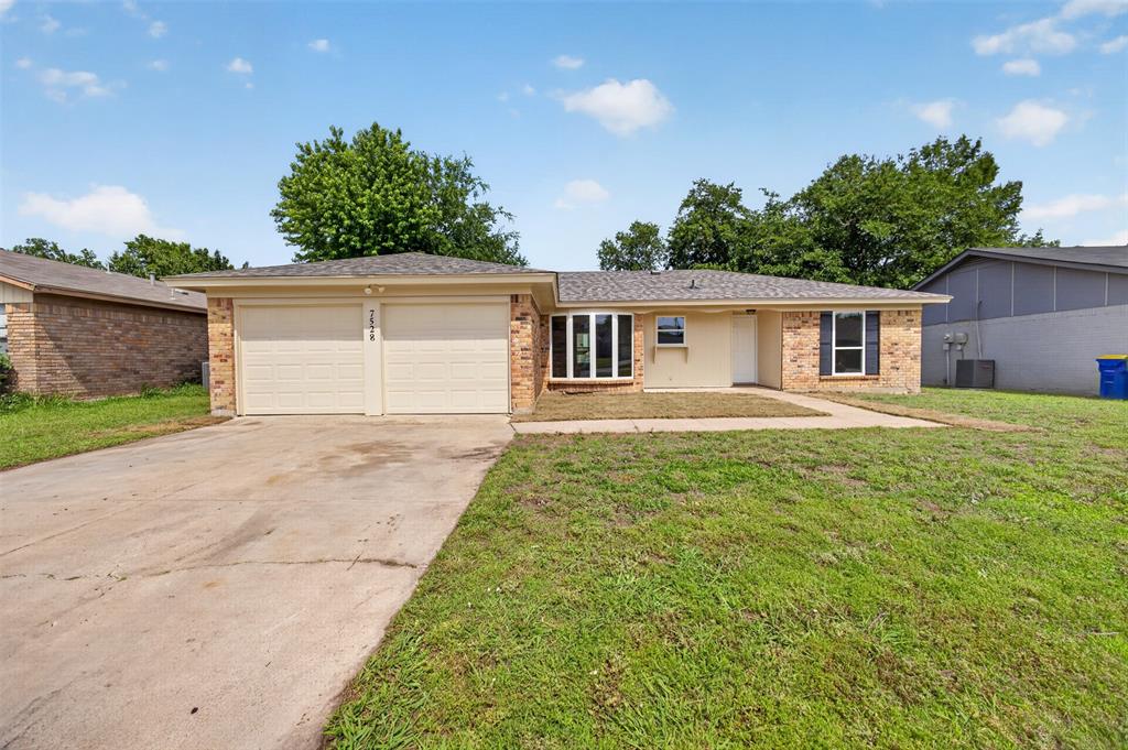 7528 Meadowlark Lane North Watauga, TX 76148 - Photo 1 of 31 a house view with a garden space