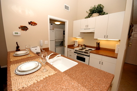 643 Summer Place, Unit 643 Ponte Vedra Beach, FL 32082 - Photo 11 of 15 a kitchen with sink and stove