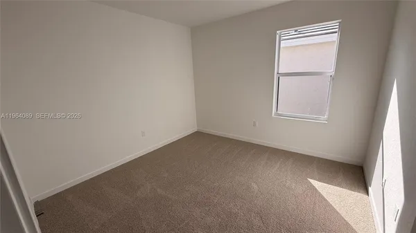 an empty room with a window
