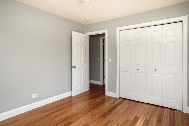 601 Highview Avenue Addison, IL 60101 - Photo 13 of 50 a view of an empty room with wooden floor