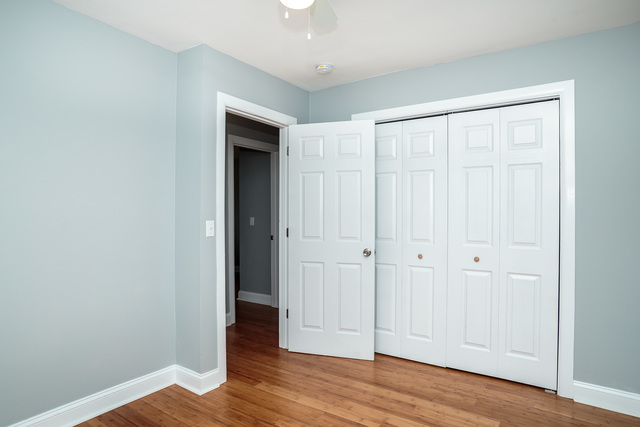 601 Highview Avenue Addison, IL 60101 - Photo 15 of 50 a view of an empty room with wooden floor
