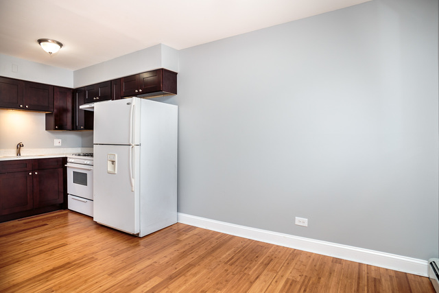 601 Highview Avenue Addison, IL 60101 - Photo 22 of 50 a view of a kitchen with wooden floor