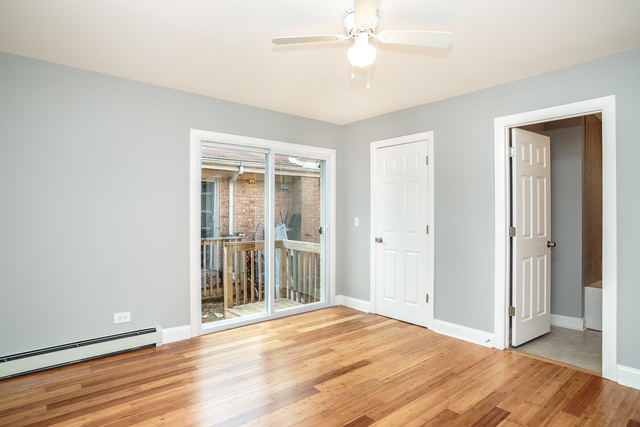 601 Highview Avenue Addison, IL 60101 - Photo 25 of 50 a view of an empty room with wooden floor