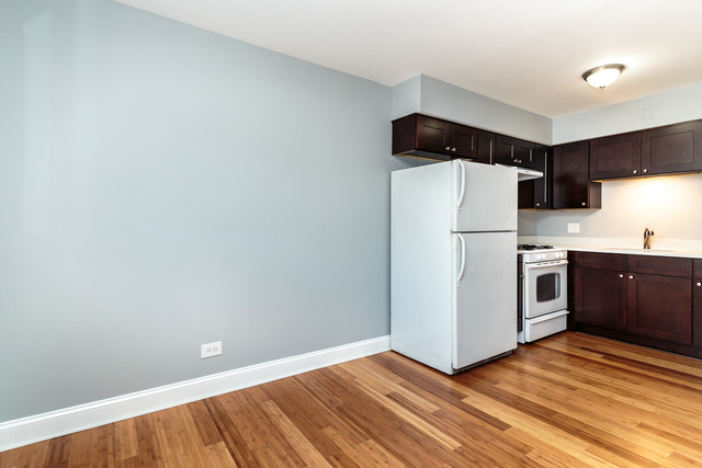 601 Highview Avenue Addison, IL 60101 - Photo 31 of 50 a view of a kitchen with a sink and an empty room