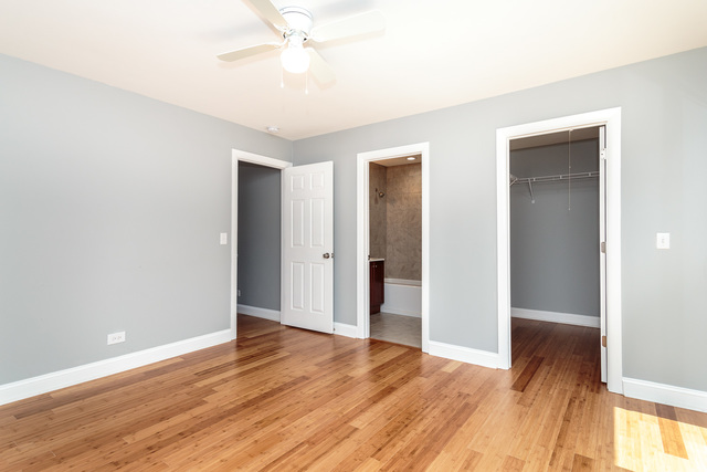 601 Highview Avenue Addison, IL 60101 - Photo 35 of 50 a view of an empty room with wooden floor