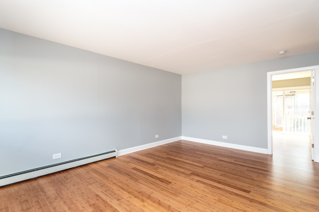 601 Highview Avenue Addison, IL 60101 - Photo 39 of 50 a view of empty room with wooden floor