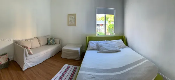 a view of a house with a wooden floor