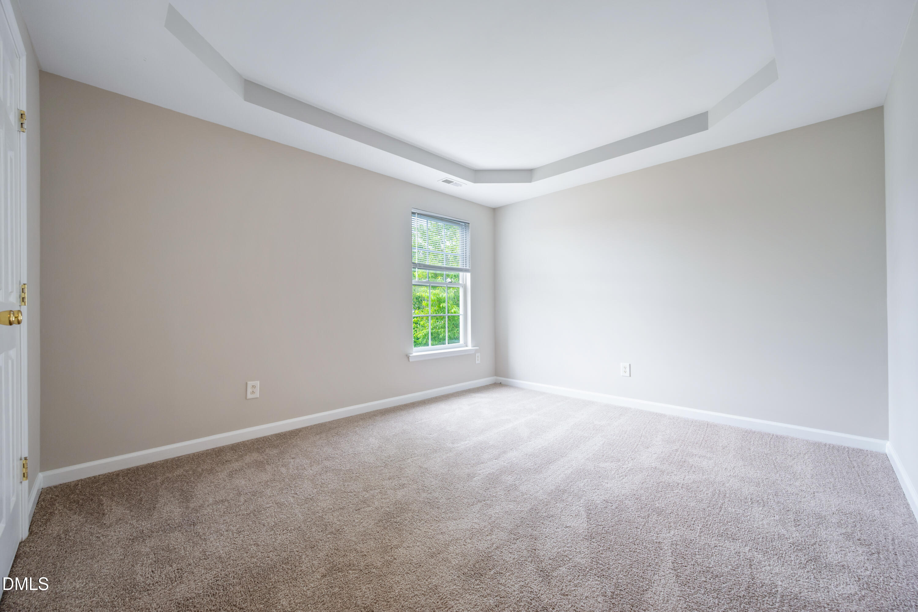 1532 Pebble Ridge Drive Raleigh, NC 27610 - Photo 32 of 40 a view of an empty room with a window