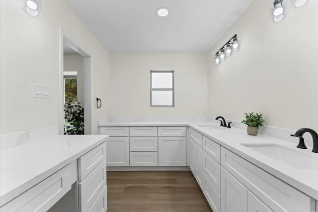 a bathroom with a sink and a bathtub
