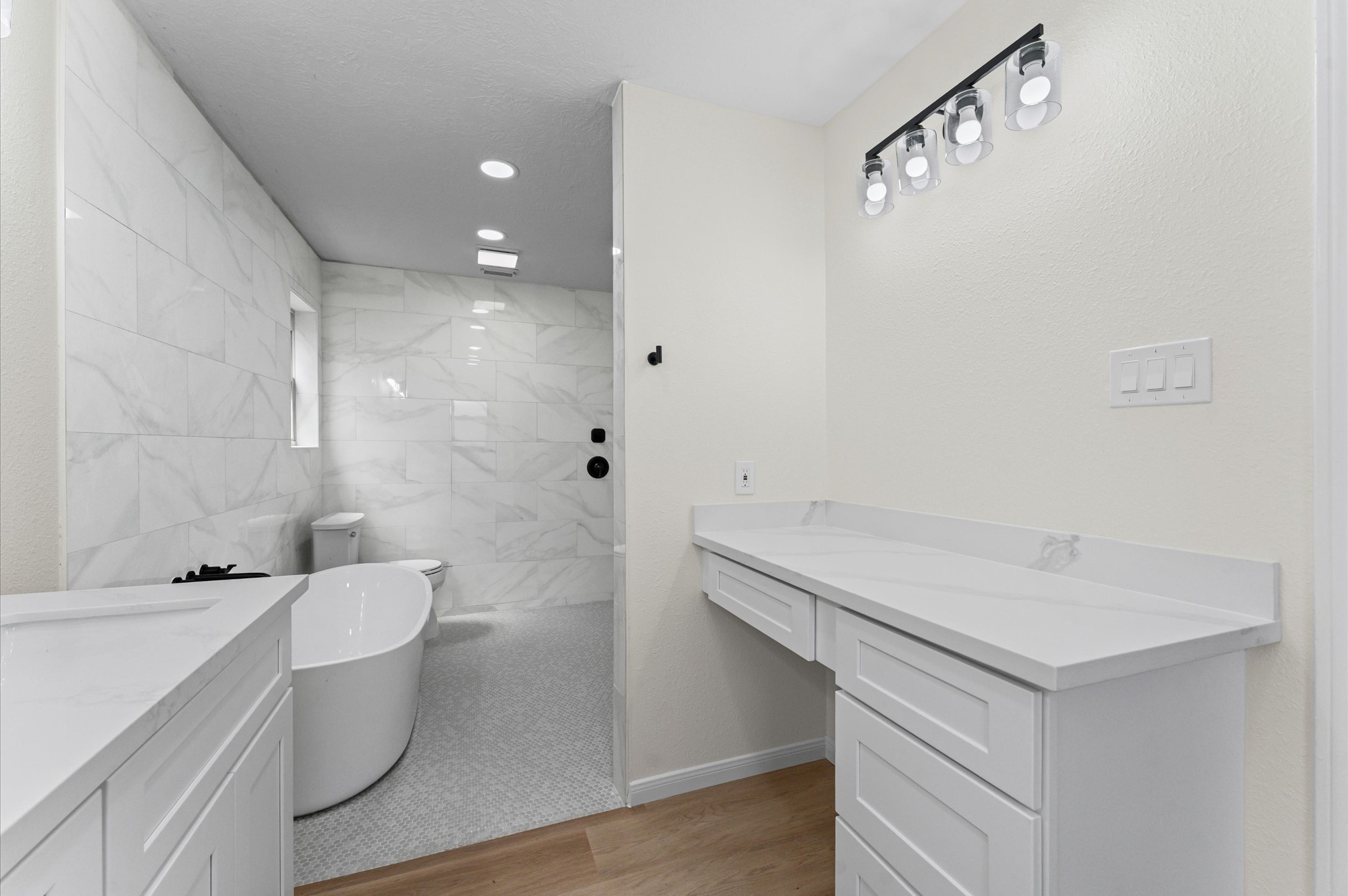 2914 Riata Lane Houston, TX 77080 - Photo 28 of 39 a bathroom with a sink a toilet and shower