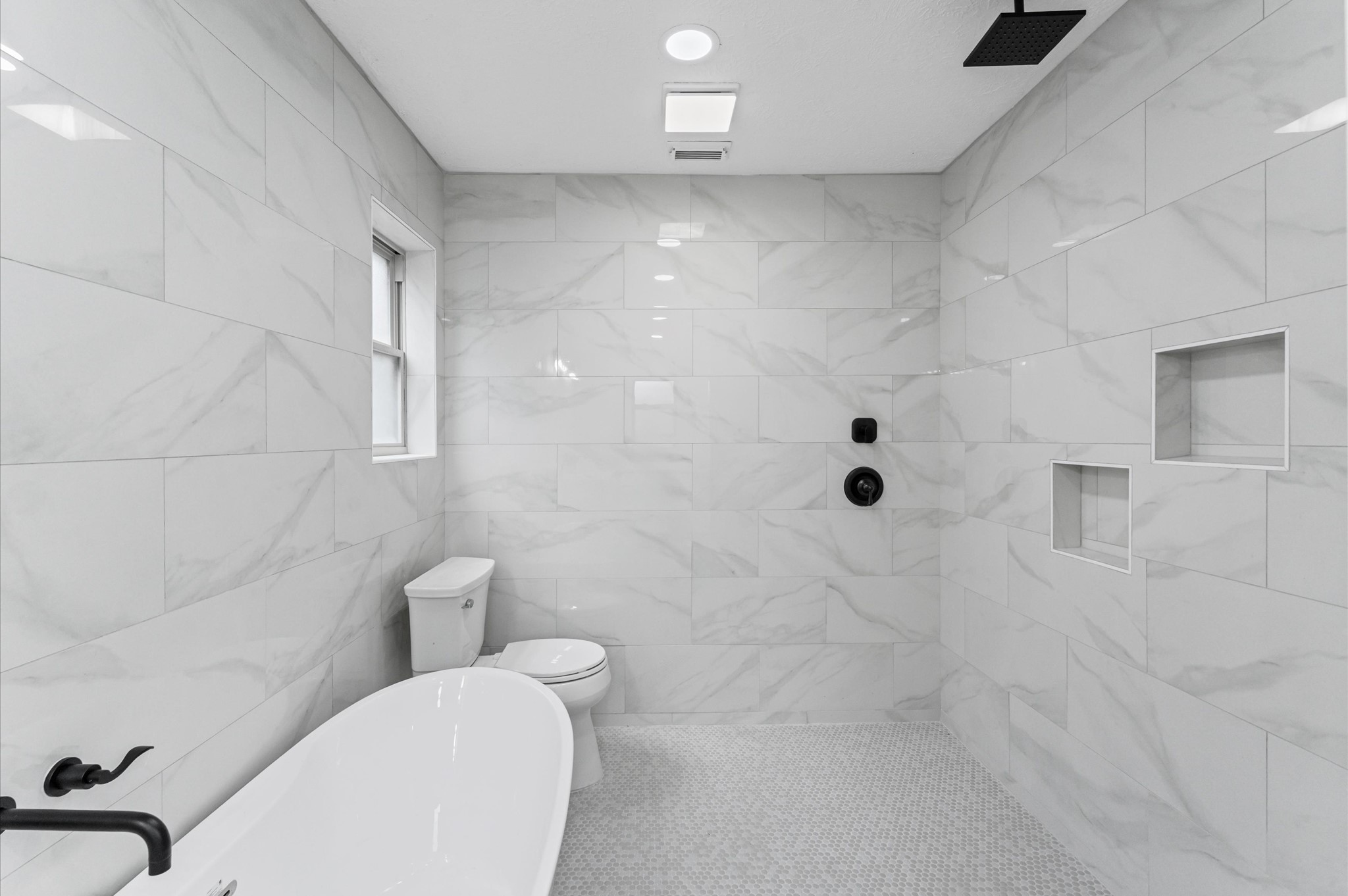 2914 Riata Lane Houston, TX 77080 - Photo 31 of 39 a bathroom with a toilet and shower