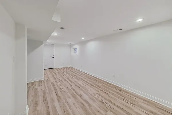 a picture of a bathroom with a shower