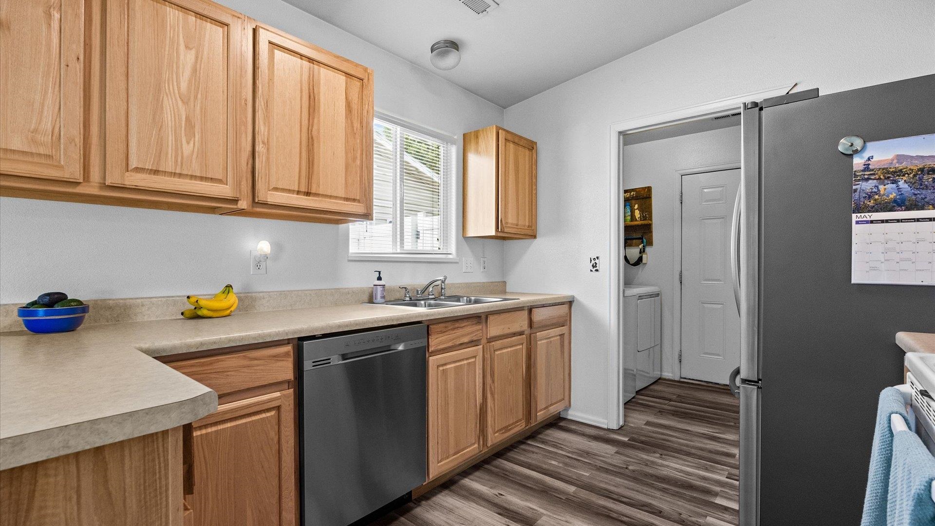420-29 29 1/2 Road Grand Junction, CO 81504 - Photo 12 of 26 a kitchen with a sink and cabinets