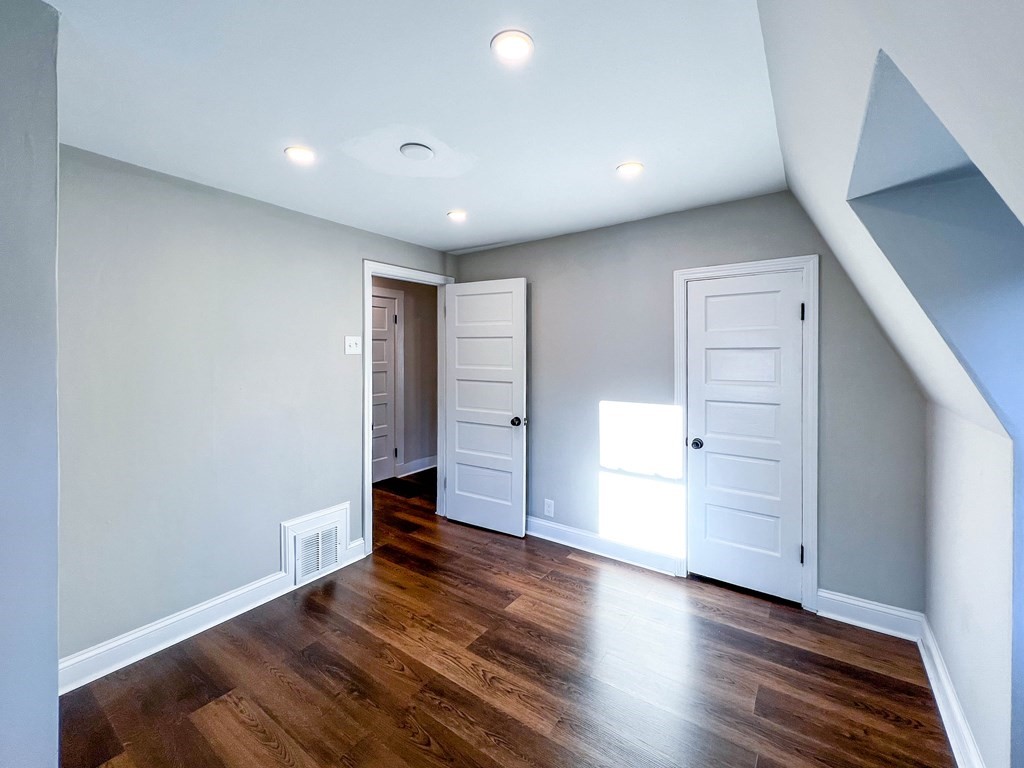 67 Waltham Street Maynard, MA 01754 - Photo 16 of 29 a view of empty room with wooden floor
