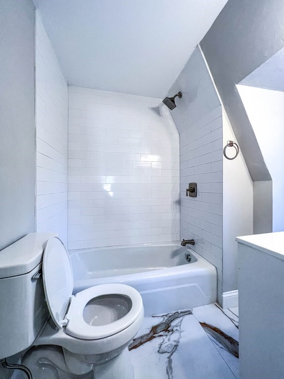 67 Waltham Street Maynard, MA 01754 - Photo 17 of 29 a bathroom with a sink and a toilet