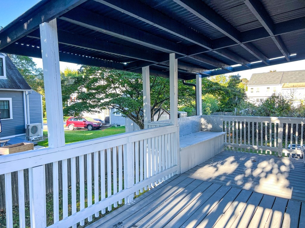 67 Waltham Street Maynard, MA 01754 - Photo 25 of 29 a view of a porch with wooden floor