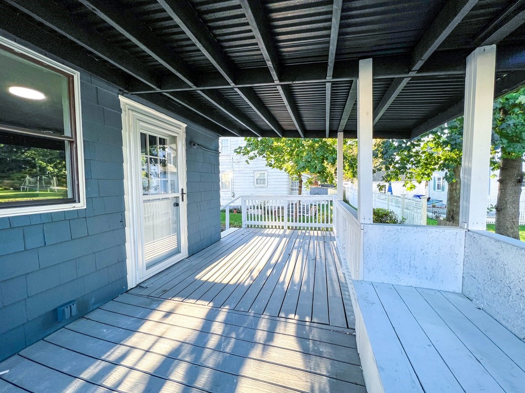 67 Waltham Street Maynard, MA 01754 - Photo 27 of 29 a view of porch with wooden floor