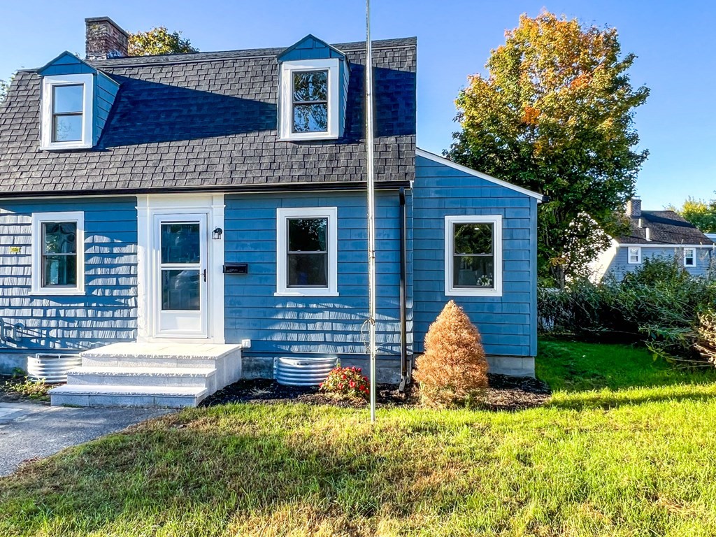 67 Waltham Street Maynard, MA 01754 - Photo 29 of 29 a front view of a house with garden