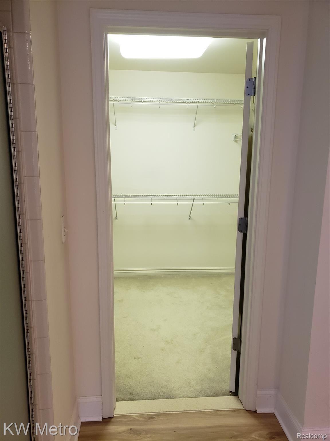 1227 Letica Drive Rochester, MI 48307 - Photo 53 of 58 Primary Bathroom with HIS Closet