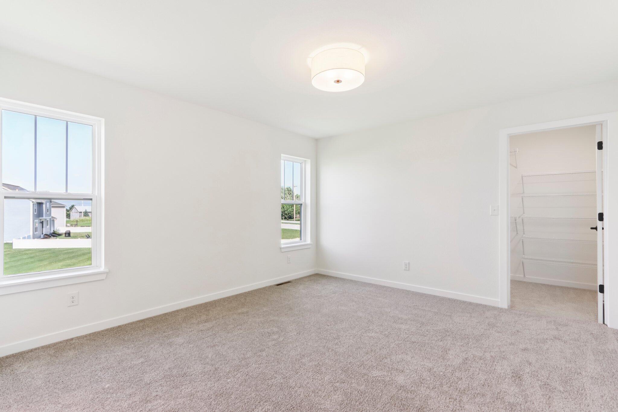 675 Mary Way Slinger, WI 53086 - Photo 16 of 30 675 Mary Way 16 Primary Bedroom