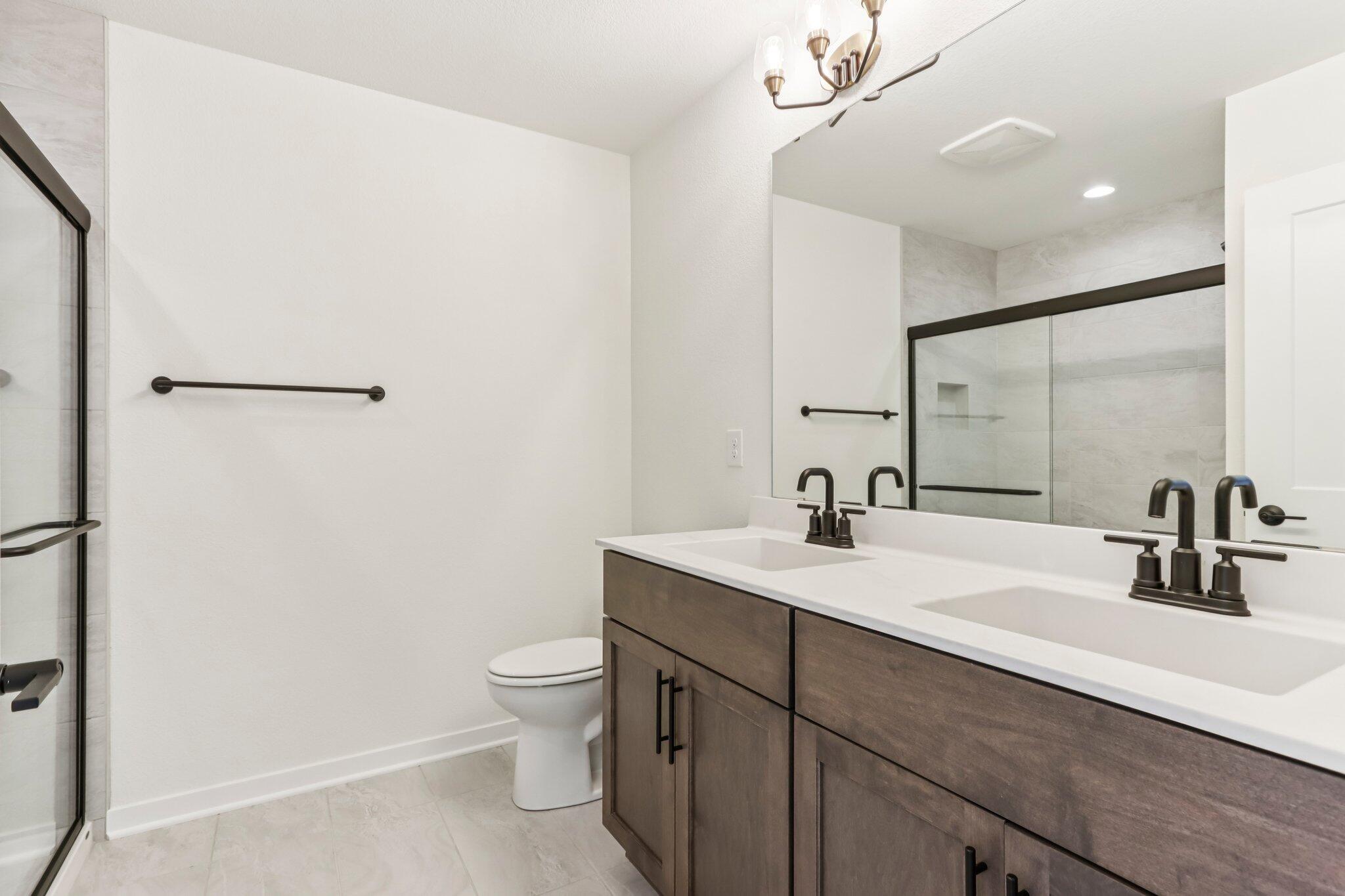 675 Mary Way Slinger, WI 53086 - Photo 19 of 30 675 Mary Way 19 Primary Bathroom