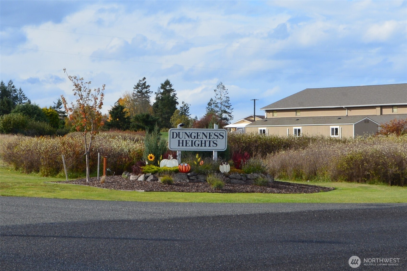 999 Moonlight Drive Sequim, WA 98382 - Photo 2 of 17 a front view of a house with garden