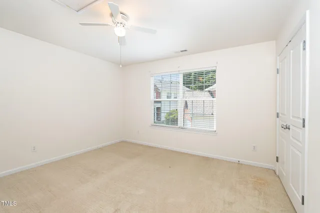 a brick house with a yard