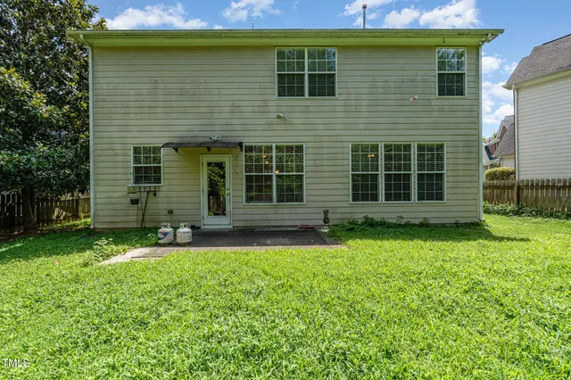 a view of backyard with green space