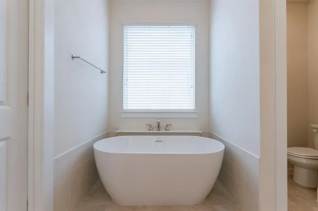 a bathroom with a bathtub