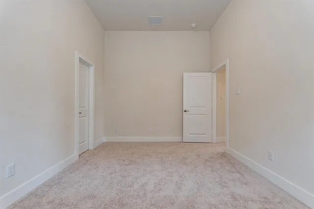 a white bath tub sitting next to a white toilet