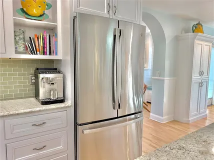 a view of a patio with wooden floor
